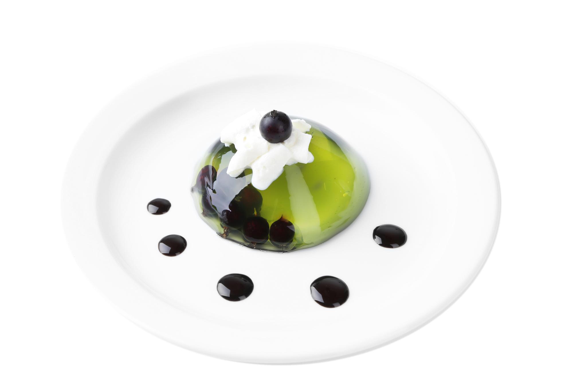Close-up modern plated starter with geometric garnish